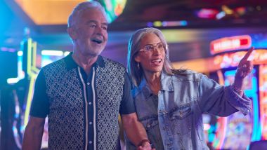 couple walking through casino